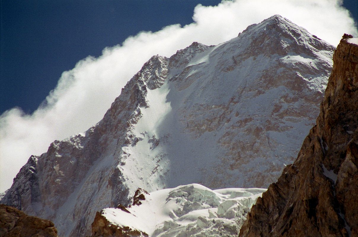 06 Gasherbrum IV Summit Close Up From Upper Baltoro Glacier On Trek To Shagring Camp The west face and summit of Gasherbrum IV poked out from between two ridges as we trekked up the Upper Baltoro Glacier towards Shagring camp